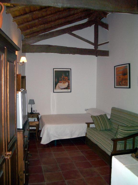 Apartamentos Rurales Victor Chamorro Del Arco Hervas Room photo